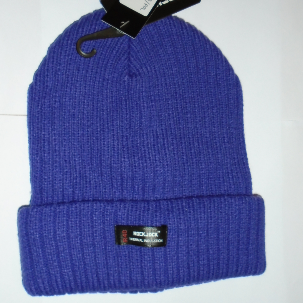 Blue knit beanie with a brand label on a white background