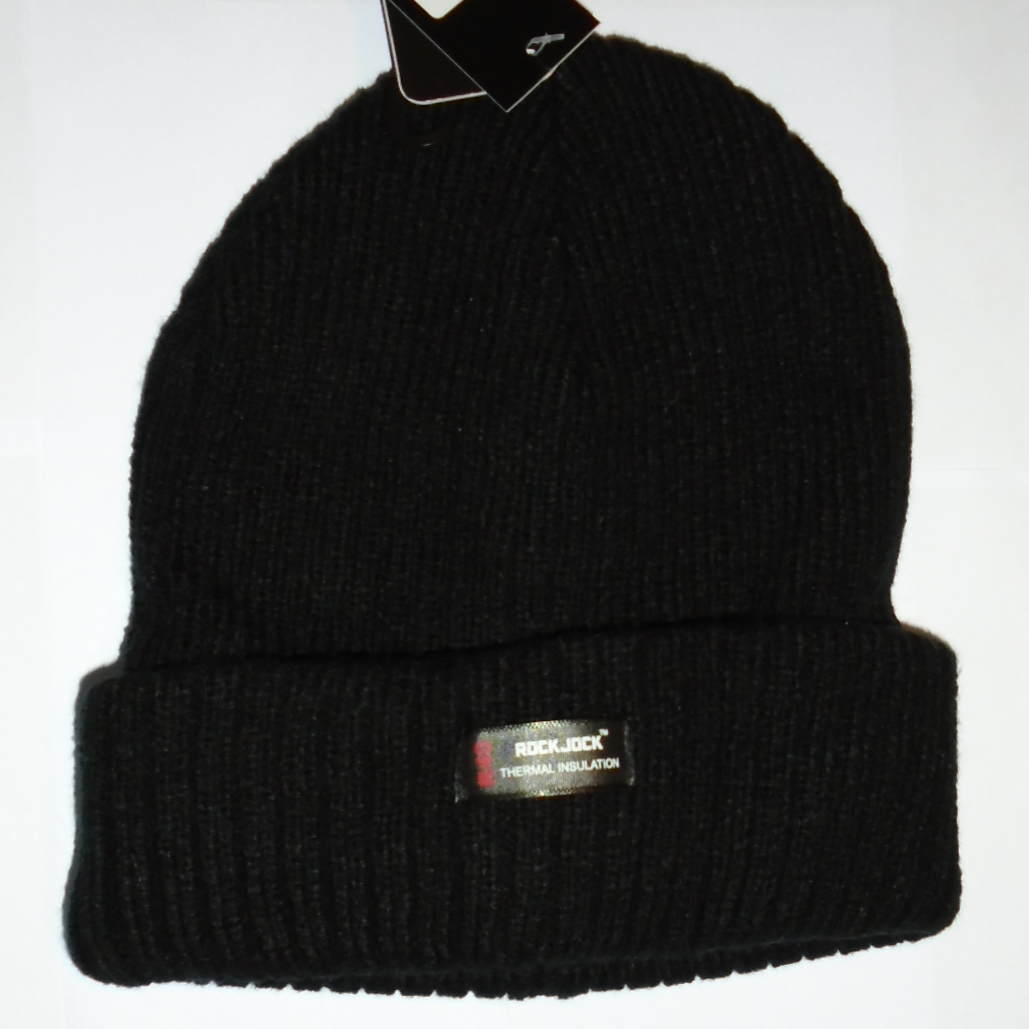 Black knit beanie with a label on a white background