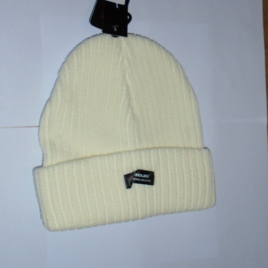 White beanie with a brand tag on a light gray background