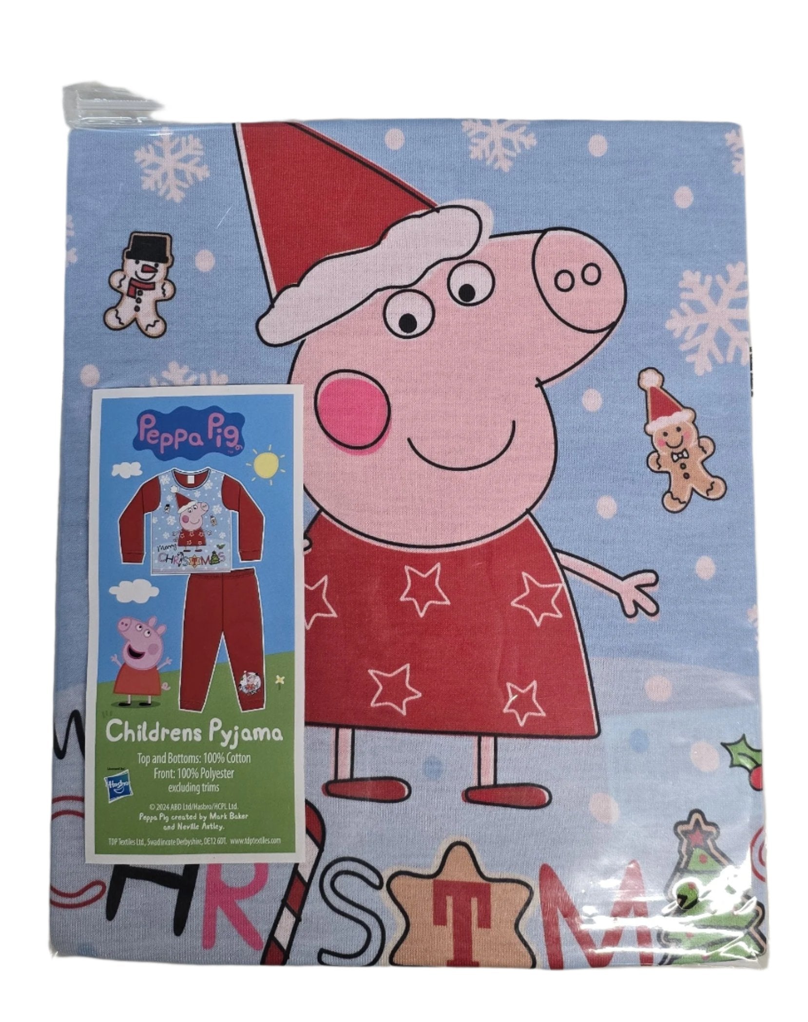 Children's pajama set packaging with Peppa Pig design on a blue background with snowflakes.