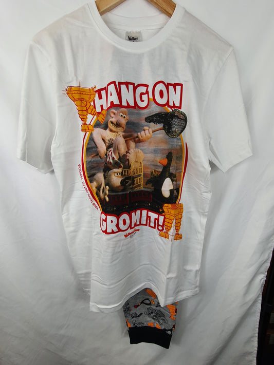 White t-shirt with graphic design and text 'Hang on Gromit!' on a white background