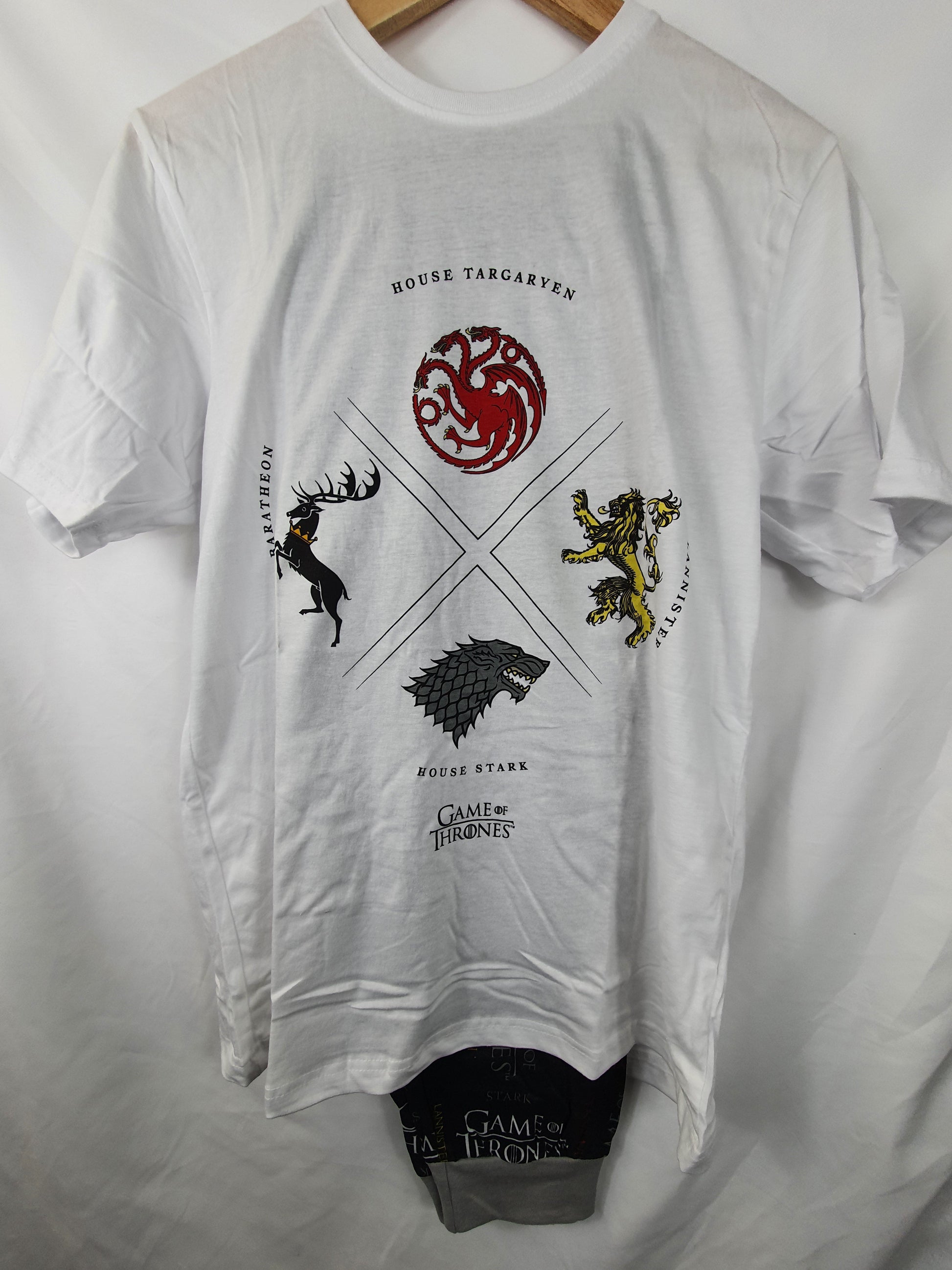 White t-shirt with Game of Thrones house sigils on a white background