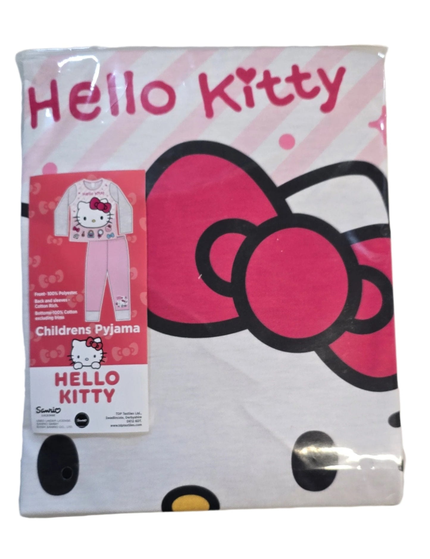 Hello Kitty branded children's pajama set packaging with pink bow and polka dot design.