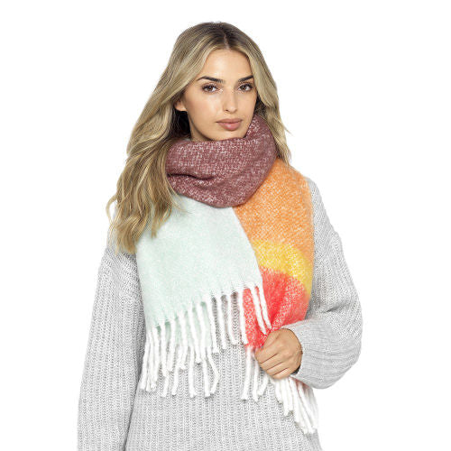 Woman wearing a colorful scarf with a white background