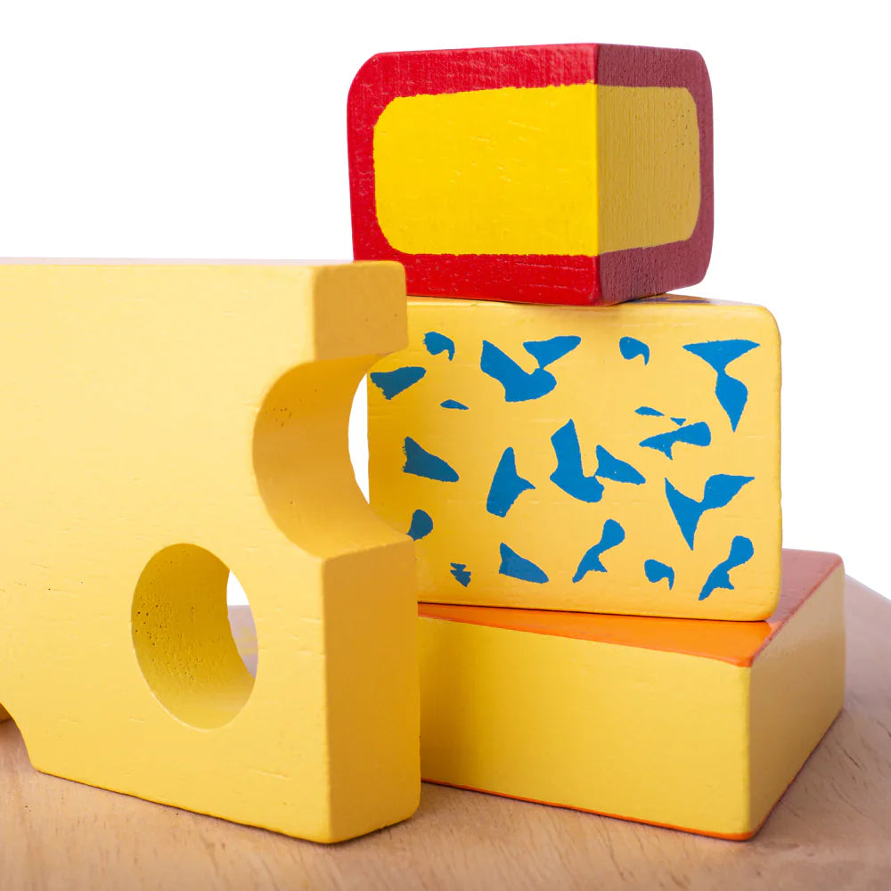 Colorful foam blocks with different patterns on a wooden surface