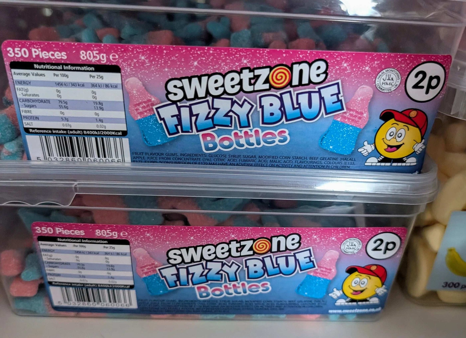 Sweetzone fizzy blue bottle sweets in a clear 805g tub with approx 350 pieces