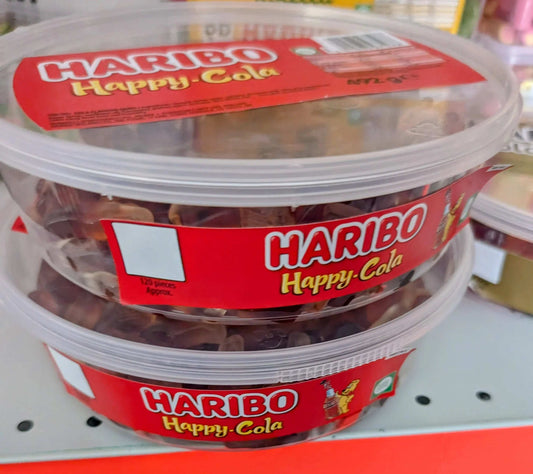 Clear 492 g tub of Haribo Happy Cola gummy sweets shaped like cola bottles with transparent brown tops and cream bottoms