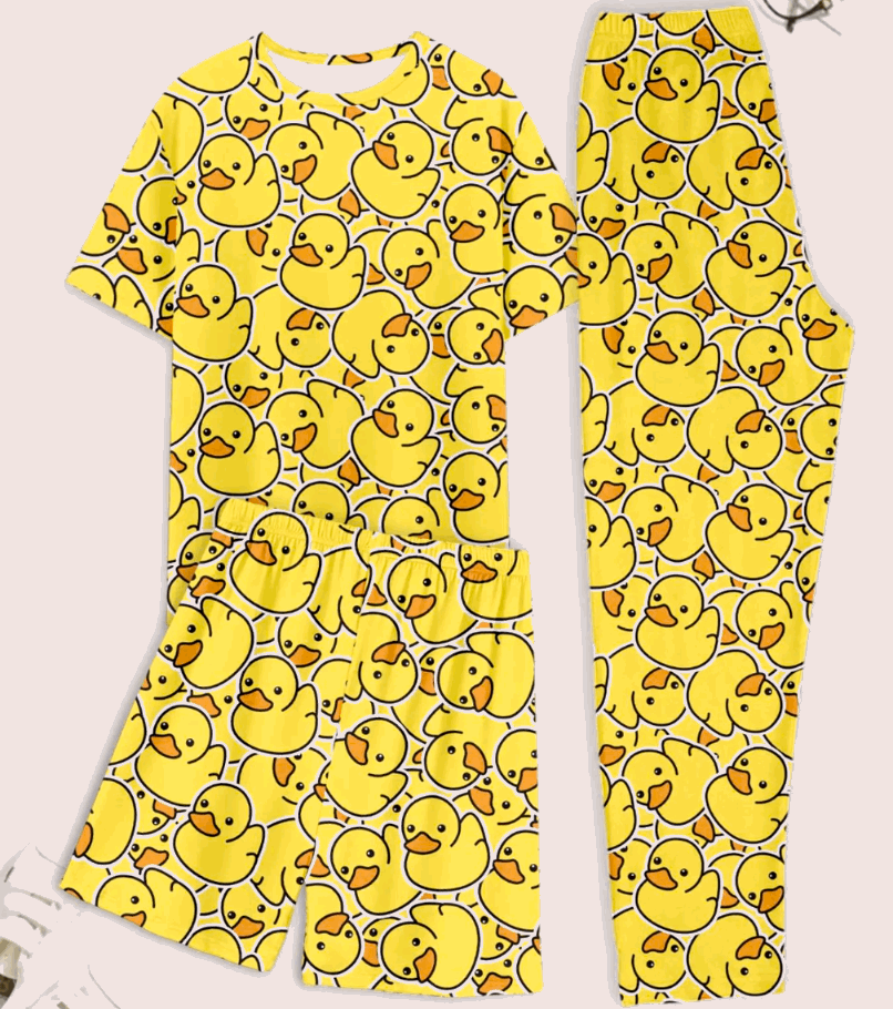 Yellow pajama set with duck pattern on a light pink background