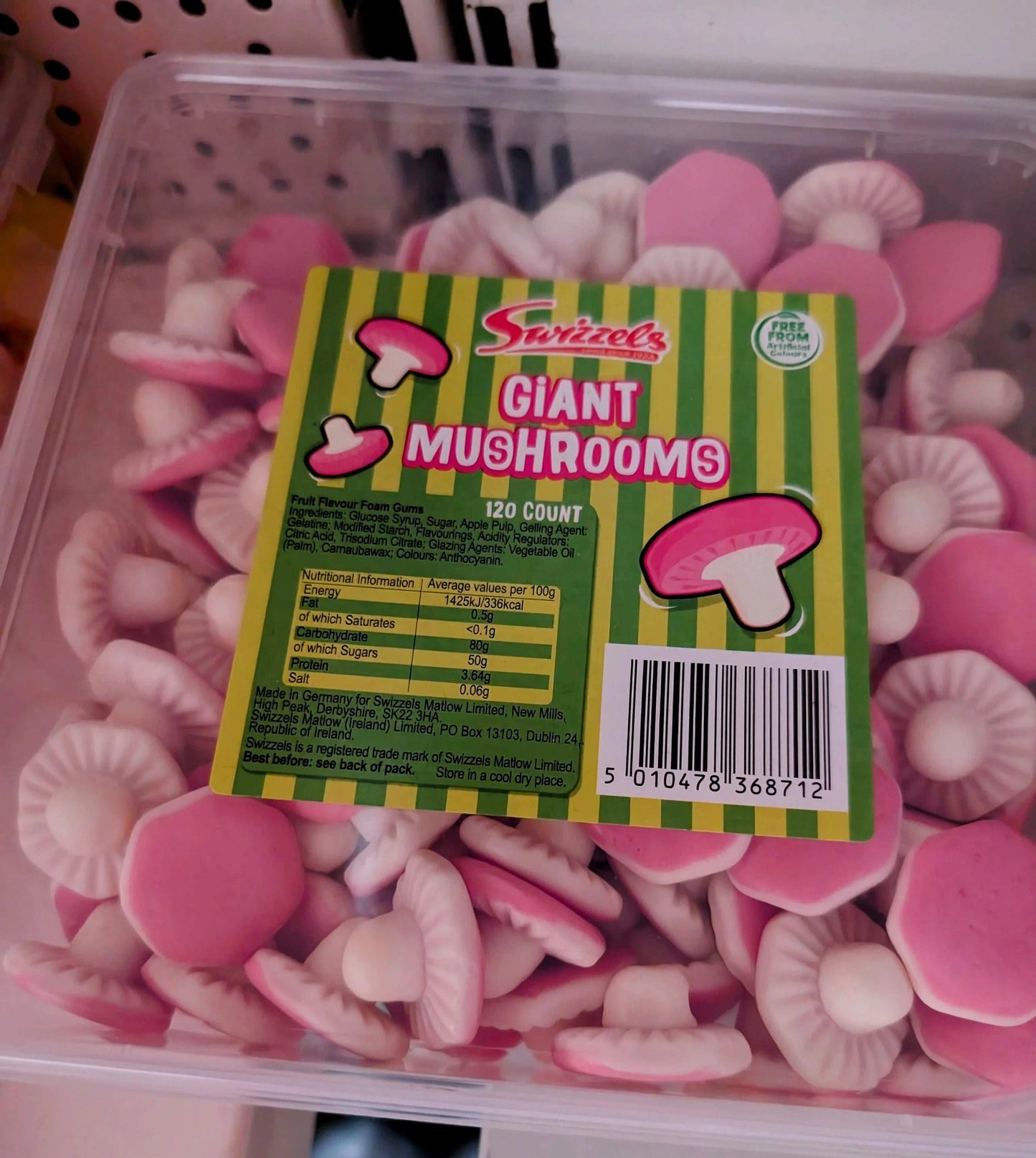 Plastic tub of Swizzels Giant Mushrooms foam gummy sweets, pink and white mushroom shapes
