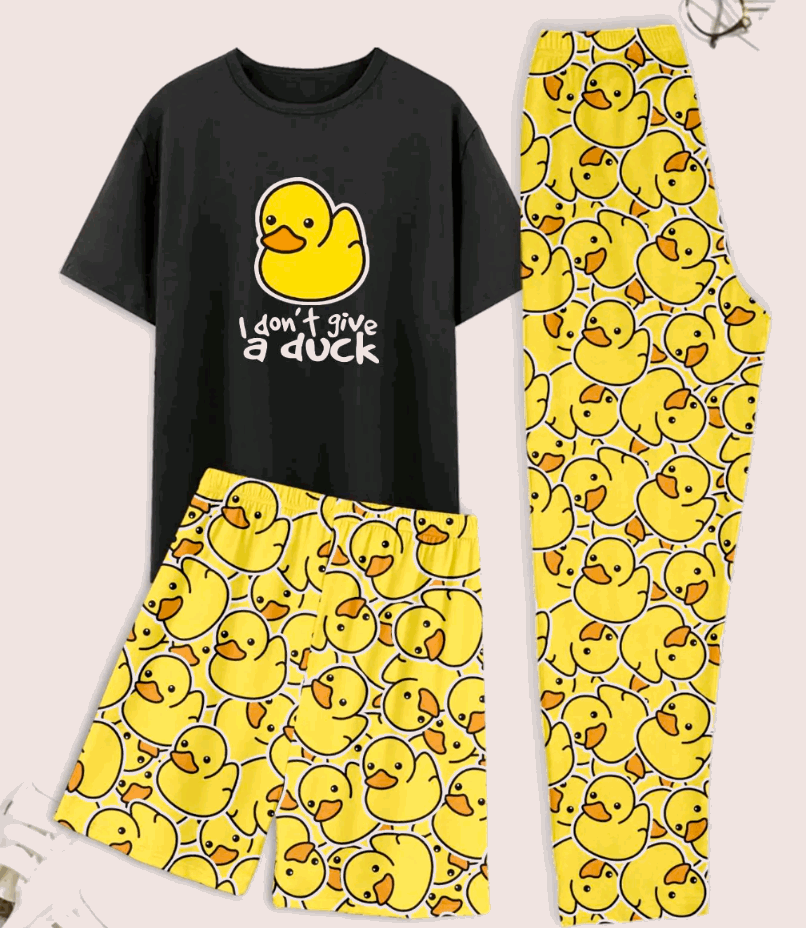 Black t-shirt with a yellow duck graphic and text, paired with yellow pajama pants featuring a duck pattern on a light pink background.